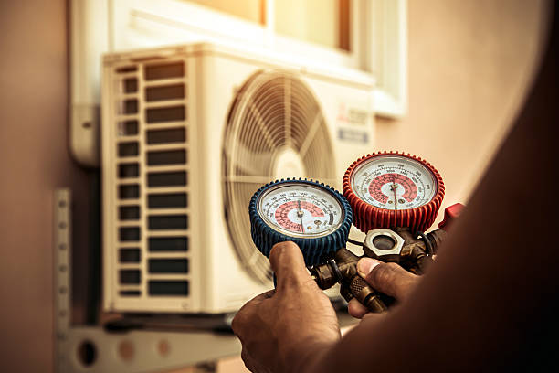 Professional Heat Pump Repair technician working in Wassaic, NY